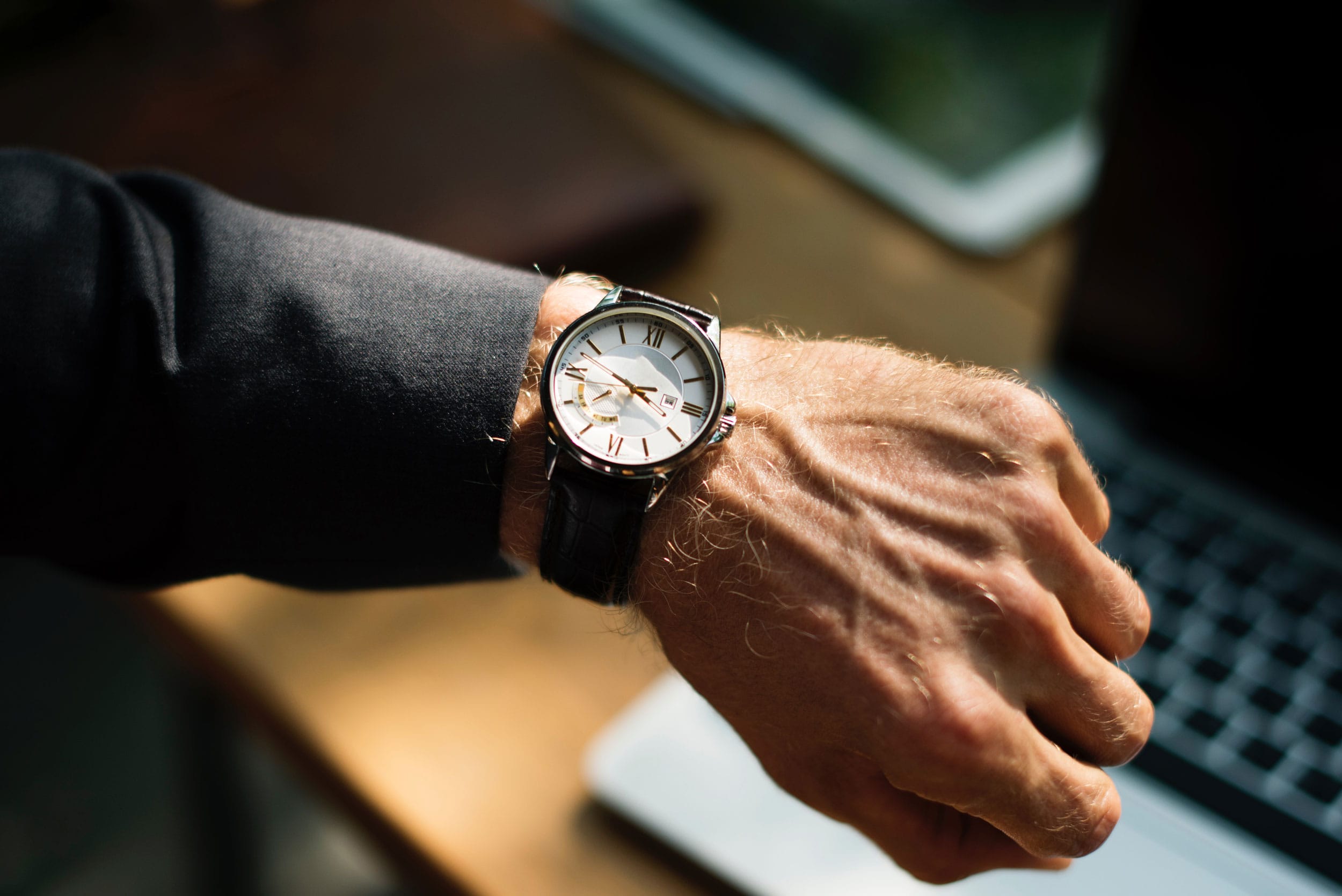 A man showcasing the watch on his left wrist